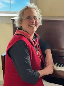 Claudia Phillips give piano lessons at the Red Barn Music School in Amherst Massachusetts