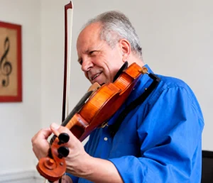 Stephen Dydo teaches violin at the Red Barn Music School in Amherst, Massachusetts